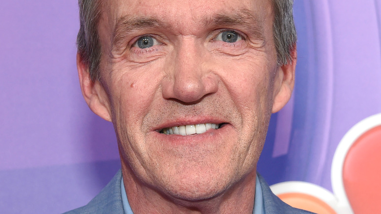 Neil Flynn smiling on red carpet 