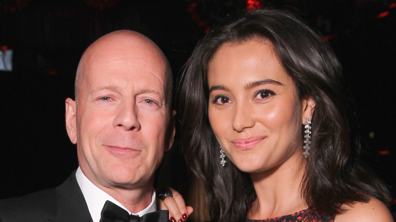 Bruce Willis and Emma Heming in fancy clothes