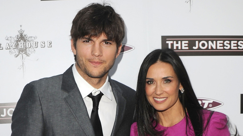 Demi Moore and Ashton Kutcher posing