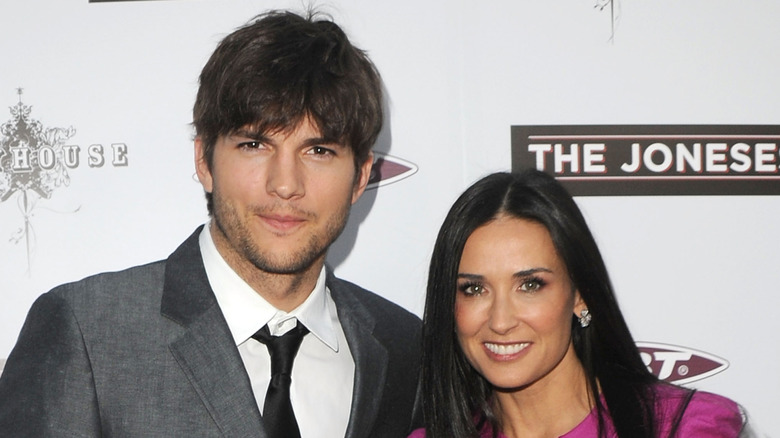 Demi Moore and Ashton Kutcher posing