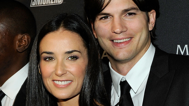 Demi Moore and Ashton Kutcher posing