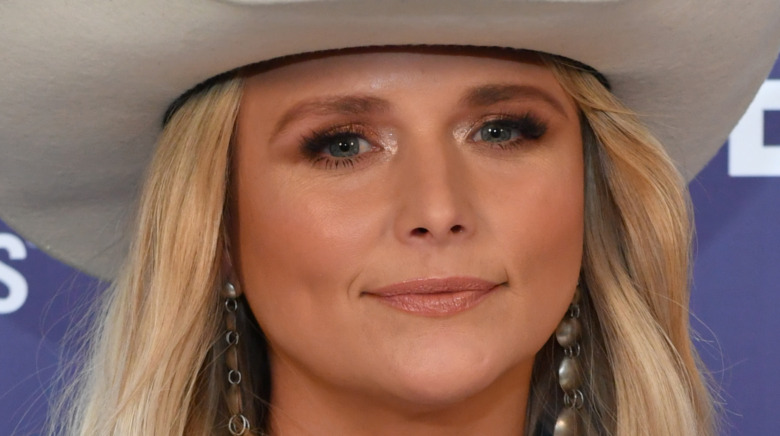 Miranda Lambert, smiling with no teeth, 2021 red carpet, wearing a cowboy hat