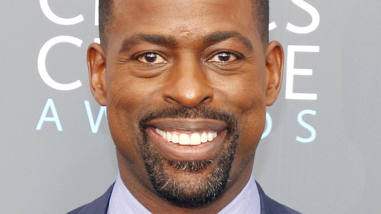 Sterling K. Brown wearing a blue suit