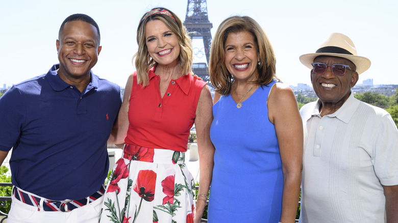 Craig Melvin, Savannah Guthrie, Hoda Kotb, and Al Roker posing for a photo in Paris