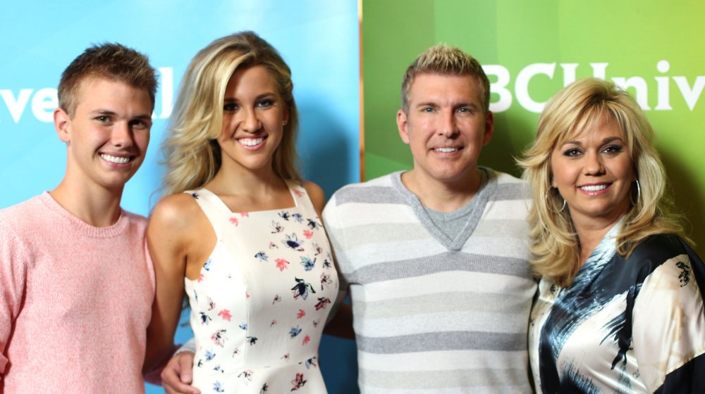 Chase Chrisley, Savannah Chrisley, Todd Chrisley, Julie Chrisley posing at an event together