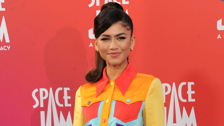 Zendaya smiling at an event