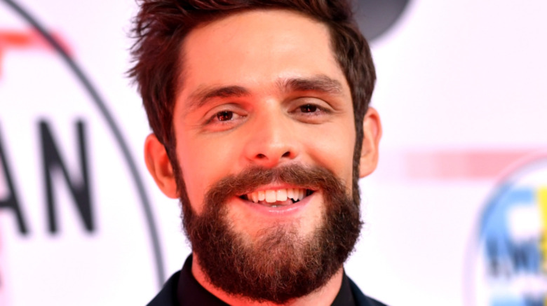 Thomas Rhett smiling