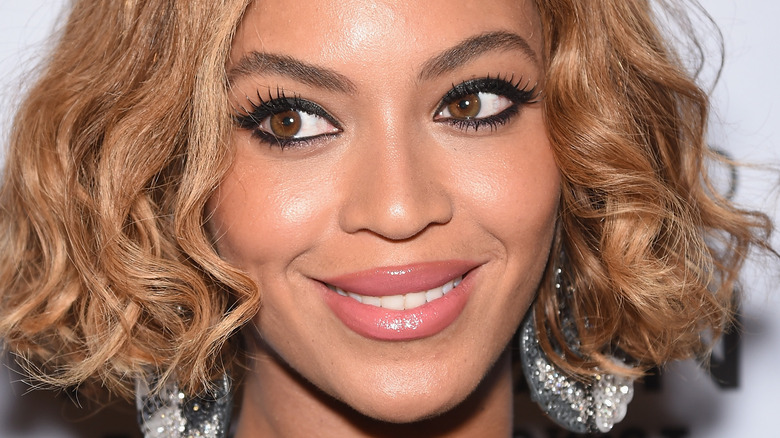 Beyonce smiling for photo