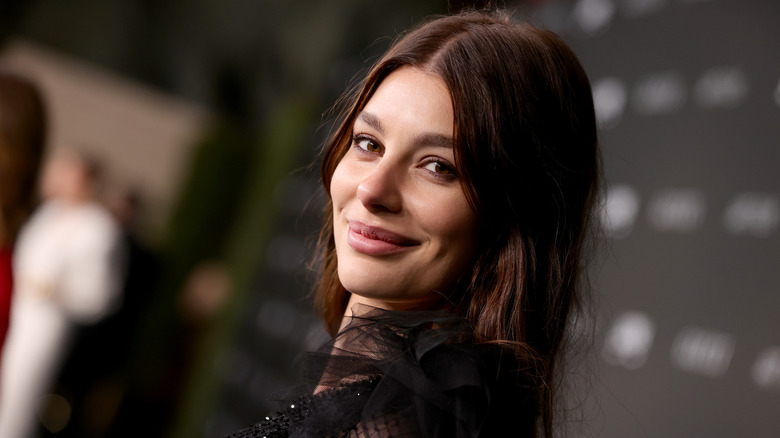 Camila Morrone smiling