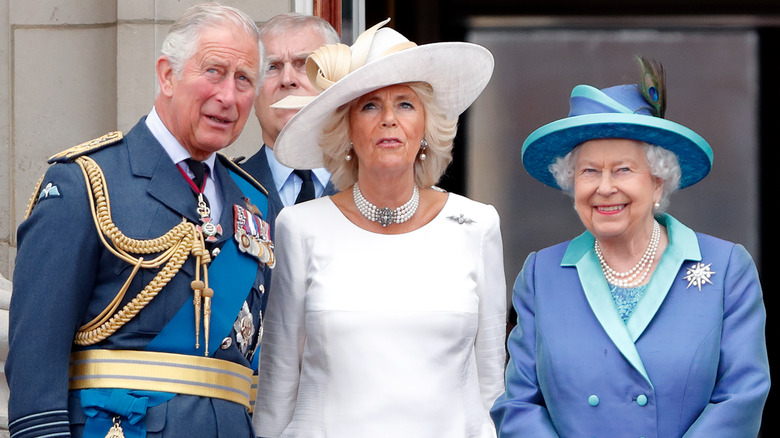 rince Charles, Prince of Wales, Camilla, Duchess of Cornwall and Queen Elizabeth II watching a flypast