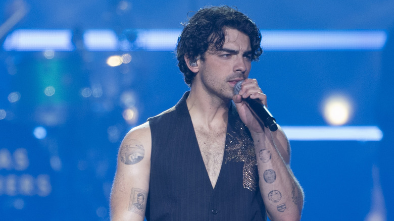 Joe Jonas singing on stage