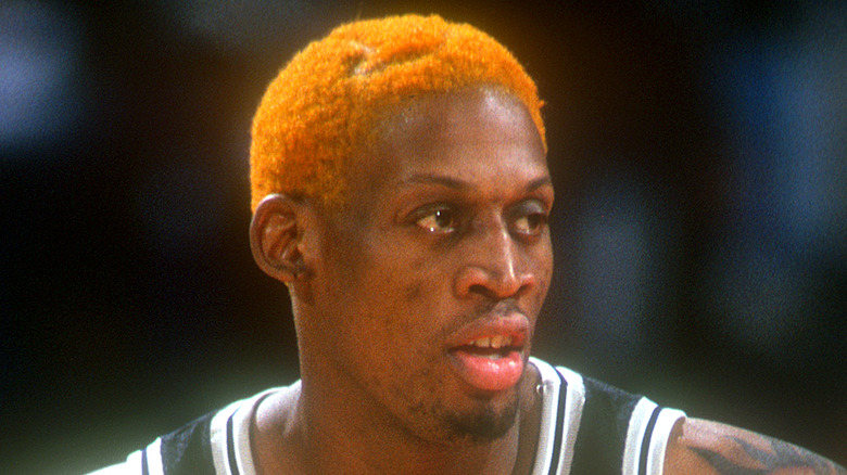 Dennis Rodman looks away from camera during NBA game