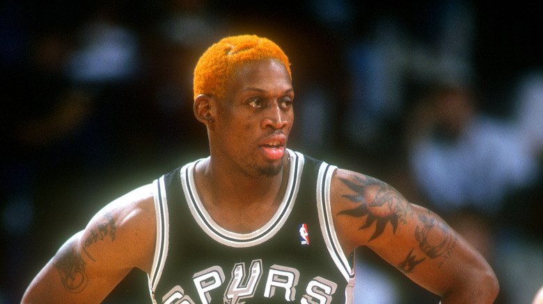 Dennis Rodman looks away from camera during NBA game
