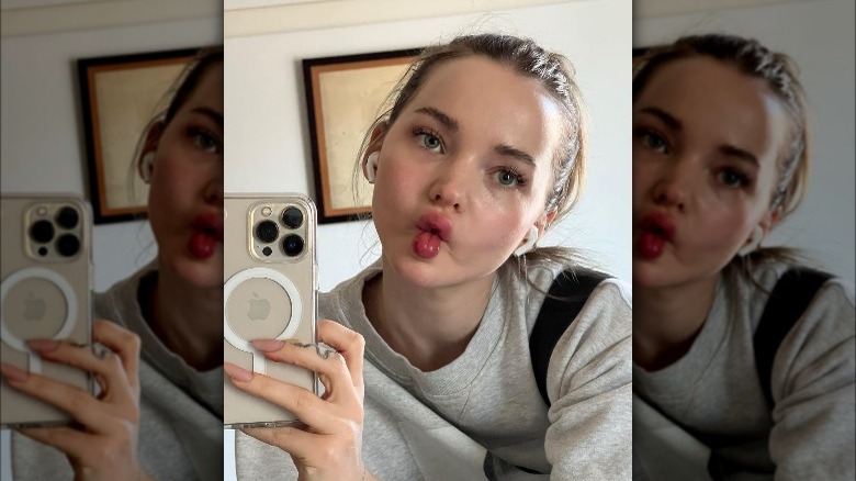 Dove Cameron posing for a mirror selfie