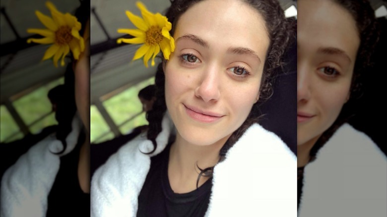 Emmy Rossum flower behind ear