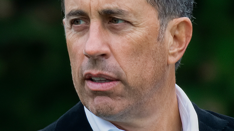 Jerry Seinfeld glances to the side