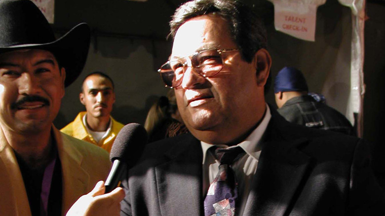 Abraham Quintanilla Jr. speaking to reporter