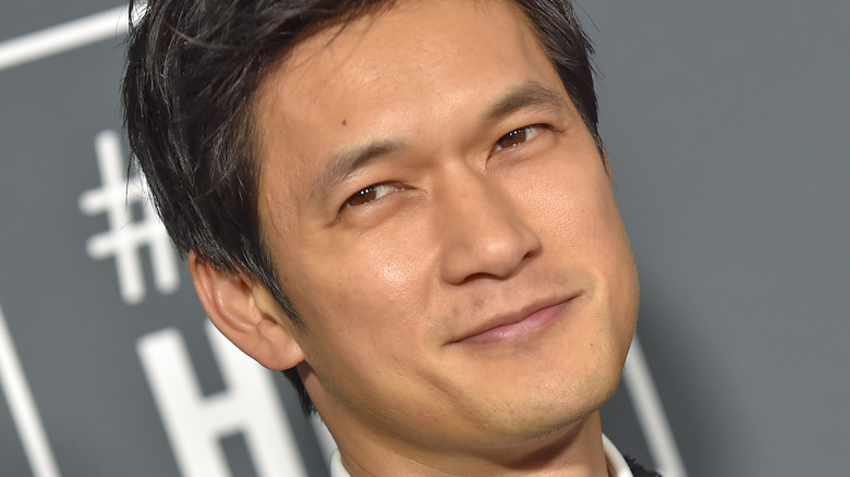Harry Shum Jr. smiling at an event