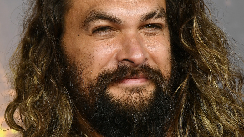 Jason Momoa smiling in 2021