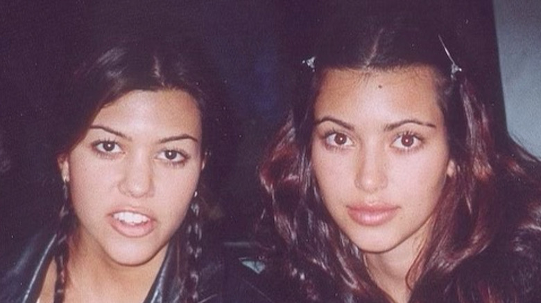 Kourtney and Kim Kardashian pose without makeup