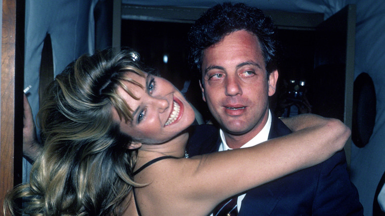 Christie Brinkley hugging Billy Joel