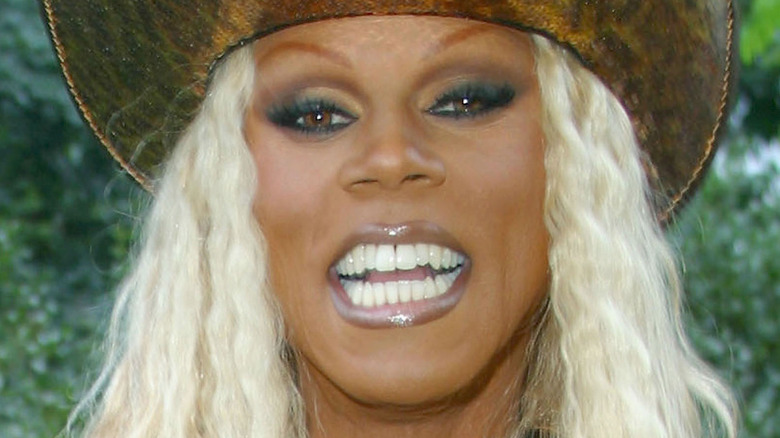 RuPaul smiling in drag