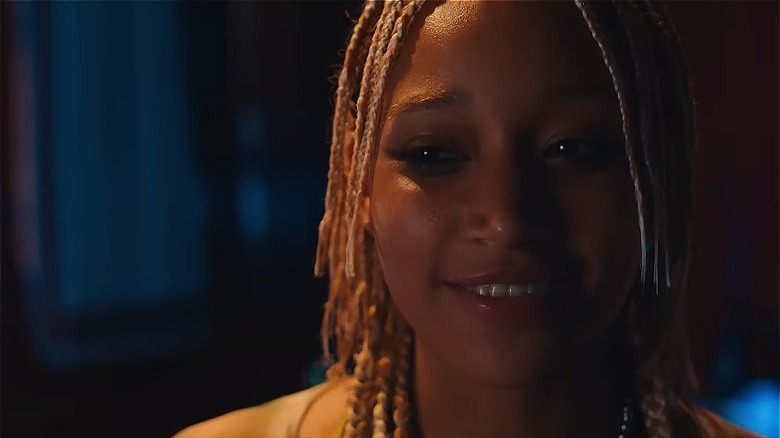 Amandla Stenberg smirking