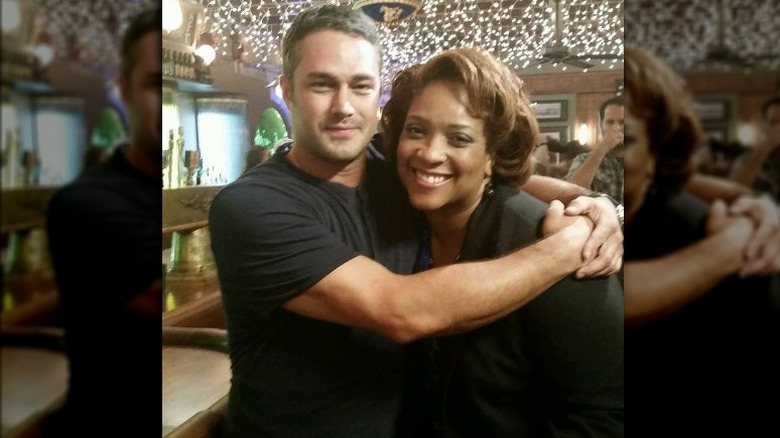 Taylor Kinney and DuShon Monique Brown