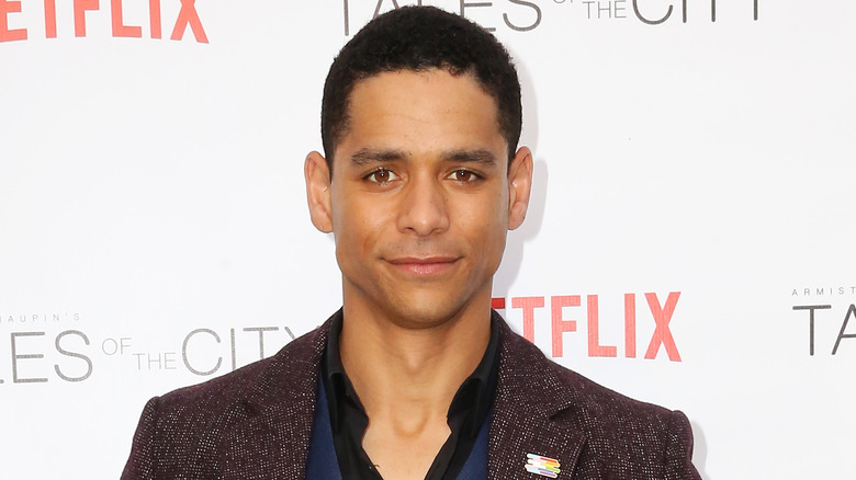 Charlie Barnett looks at the camera