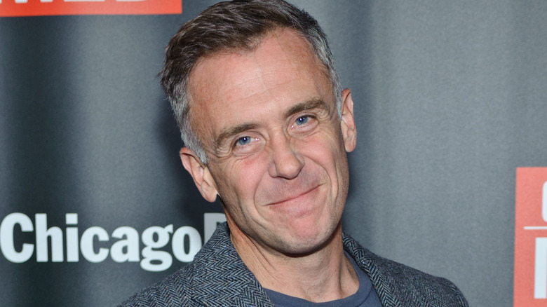 David Eigenberg smiling at camera