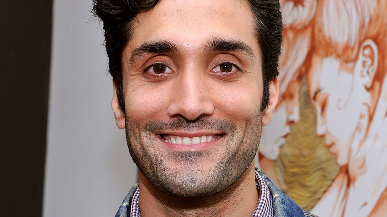 Dominic Rains smiling