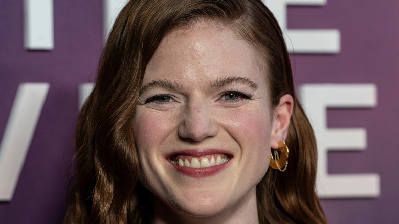 Rose Leslie grinning