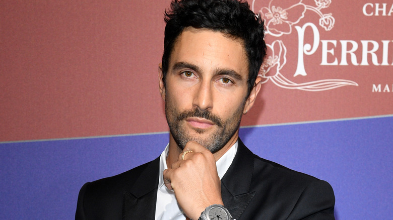 Noah Mills posing hand on chin