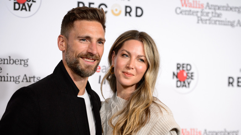 Andrew Walker and Cassandra Troy pose in 2021.