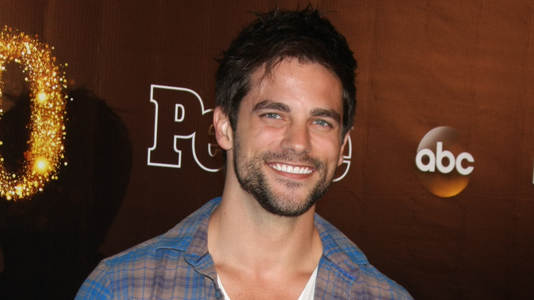 Brant Daugherty smiles