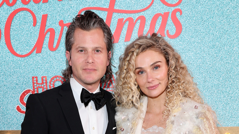 Brandon Robert Young and Clare Bowen posing