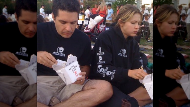 Danny Dorosh and Pascale Hutton eating in park