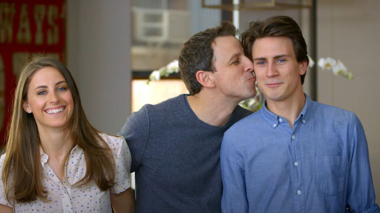 Alexi Ashe laughing, Seth Meyers kissing Tolya Ashe