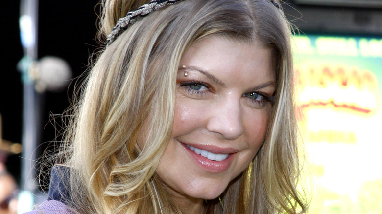 Fergie pierced eyebrow smiling