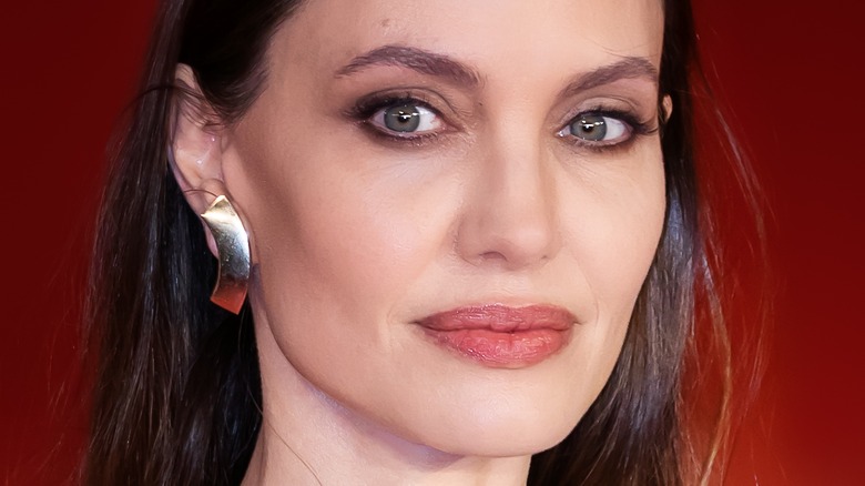Angelina Jolie posing at Eternals event