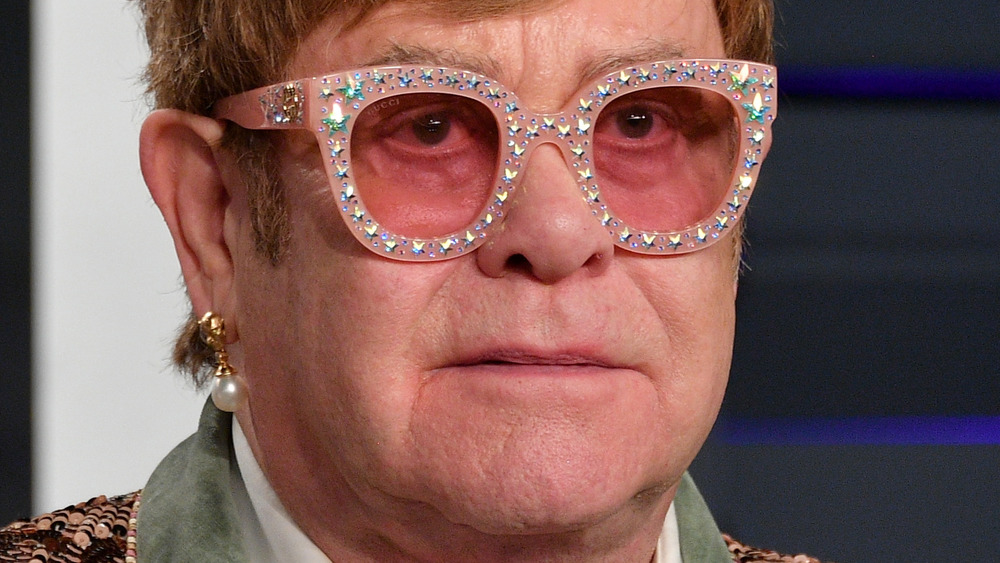 Elton John staring