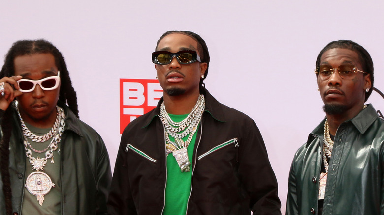 Migos wearing sunglasses