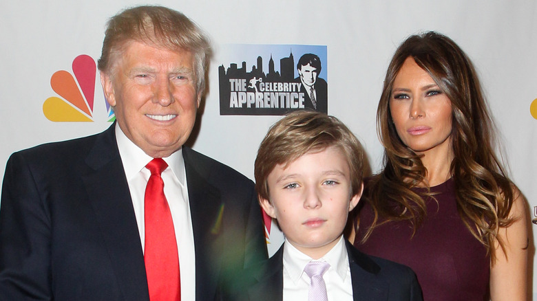 Donald, Barron and Melania Trump all smiling
