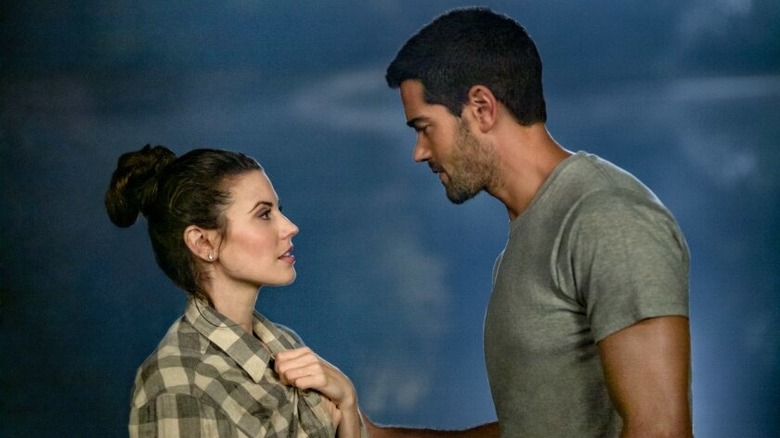 Meghan Ory looking at Jesse Metcalfe 