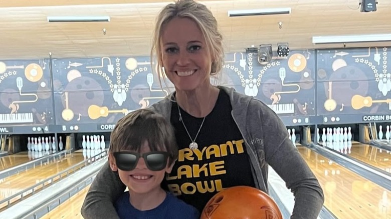 Nicole Curtis with son Harper at bowling alley
