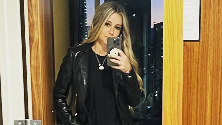 Nicole Curtis posing for Instagram snap at home