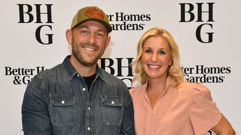Jenny and Dave Marrs are beaming with joyful smiles on the red carpet