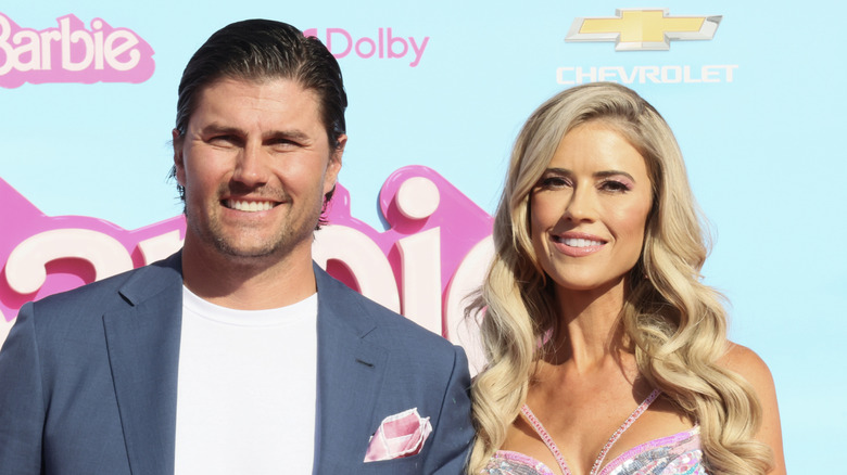 Josh Hall and Christina Haack pose at the Barbie premiere