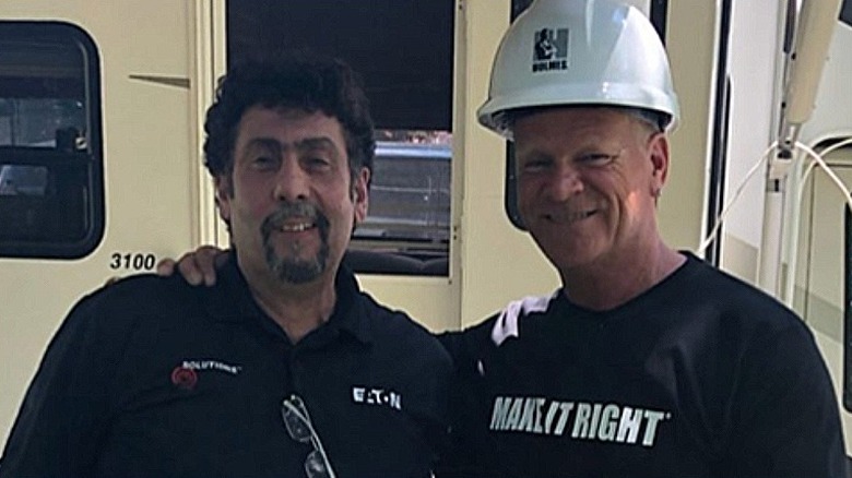 Mike Holmes and Frank Cozzolino at a construction site