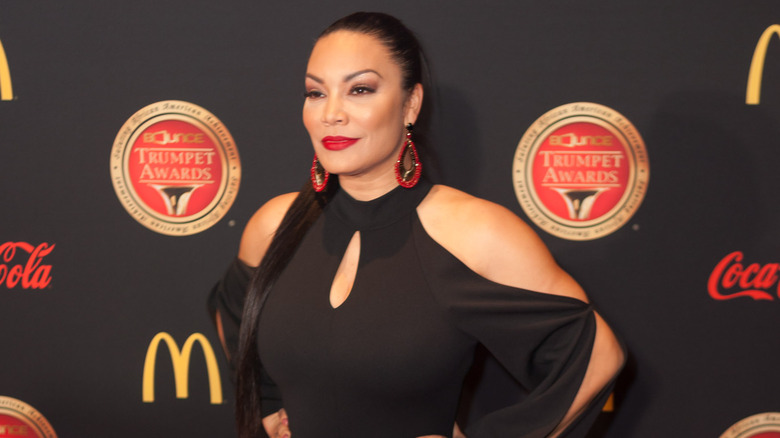 Egypt Sherrod in black